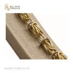 Brățară bicolor din aur galben și alb 14K cu model împletit și inele circulare decorative – design sofisticat și rezistent.