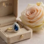 Inel din aur galben 14K cu safir albastru și 16 diamante naturale, certificat IGI – model Sofia