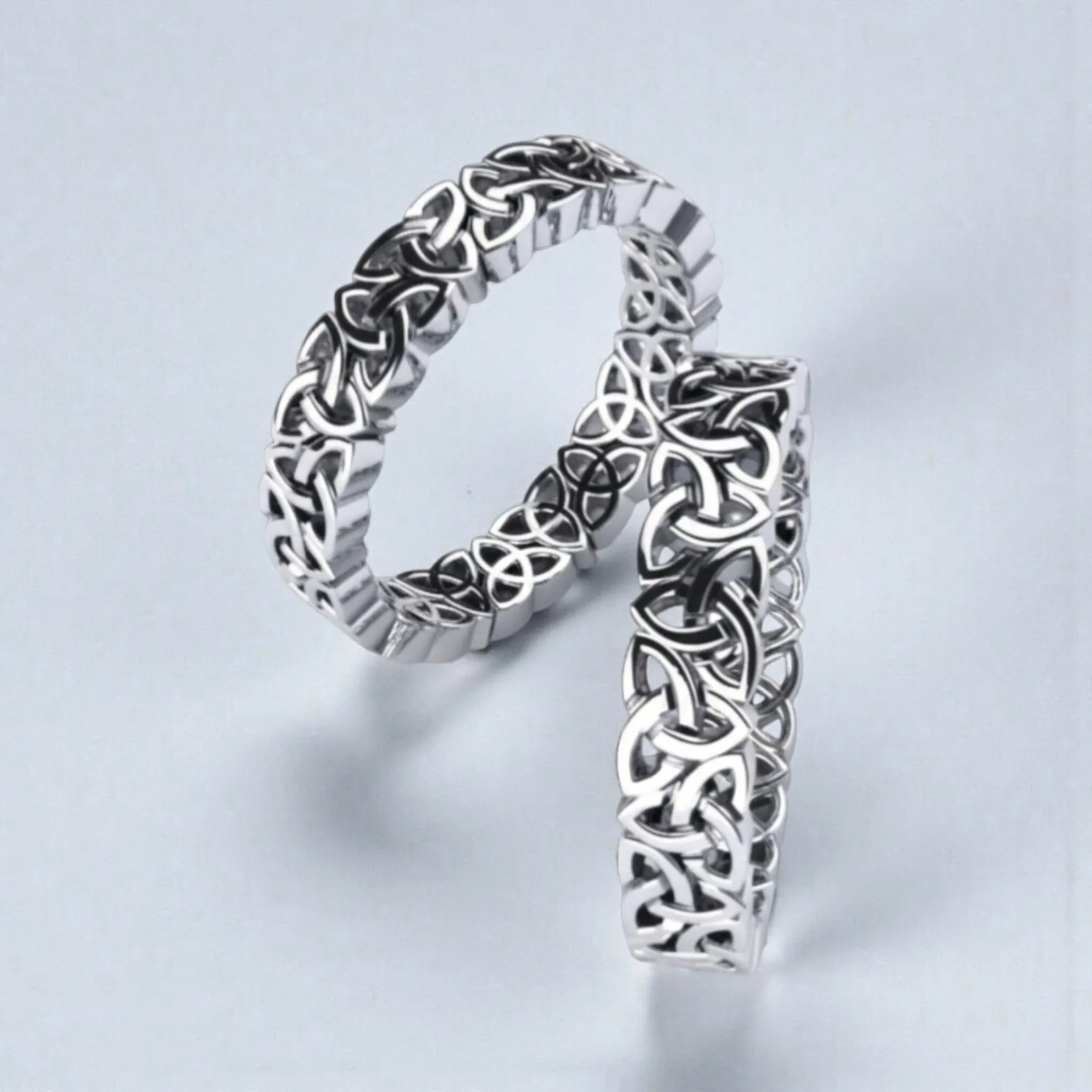 set verighete din aur alb 14K cu design impletit modern pentru cuplu