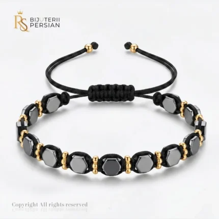 Cumperi o bratara aur galben cu snur si hematit hexagonal din aur 14K cu mărgele din hematit, biluțe din aur și nod reglabil. Comandă online!