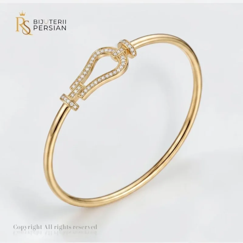Bratara fixa aur galben potcoava din aur 14K cu motiv central arcuit incrustat cu cristale de zirconiu