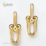 Cercei din aur galben 14K model zale interconectate cu bile metalice lucioase stil modern