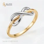 Inel aur bicolor infinit din aur 14K cu simbolul infinitului din aur alb intercalat pe sina din aur galben