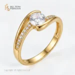 Inel aur galben solitar bypass din aur 14K cu cristal central rotund si sina dubla incrustata cu zirconiu