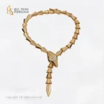 Brățară din aur galben 14K model Șarpe Serpenti cu pietre albe de zirconiu și ochi verzi din zirconiu Bijuterii Persian