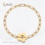 Bratara aur galben copii cu floare si lant paperclip din aur 14K cu element floral central si inchizatoare tip T-bar