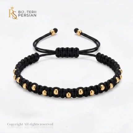 Bratara aur galben cu snur si bile netede din aur 14K distribuite simetric pe impletitura macrame neagra