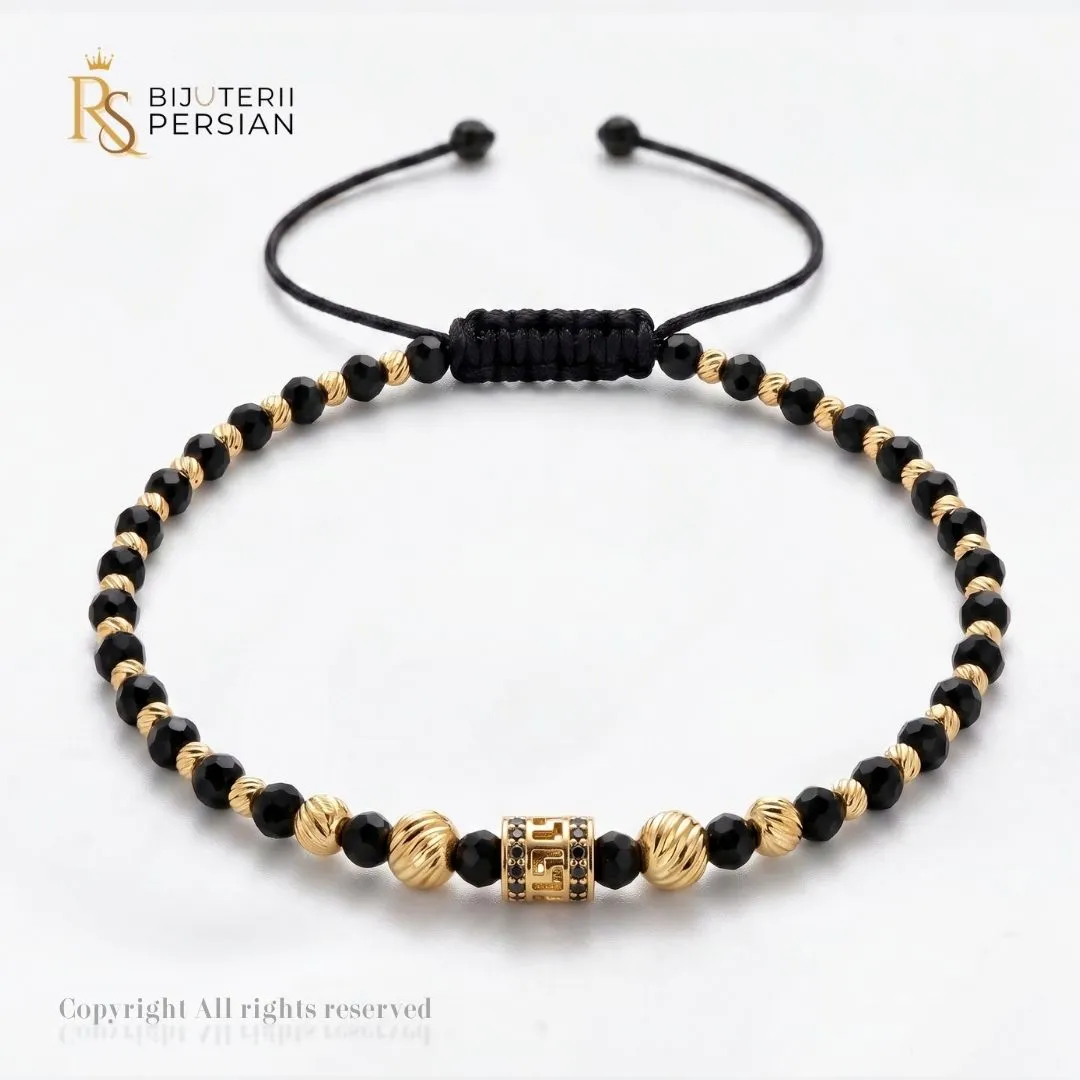 bratara-aur-galben-cu-snur-14k-cilindru-versa-bijuterii-persian Bratara aur galben cu snur si cilindru versa din aur 14K cu model grecesc incrustat cu zirconiu negru si margele de spinel