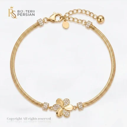 Bratara aur galben dama cu floare si zirconiu din aur 14K cu element floral central si lant herringbone impletit