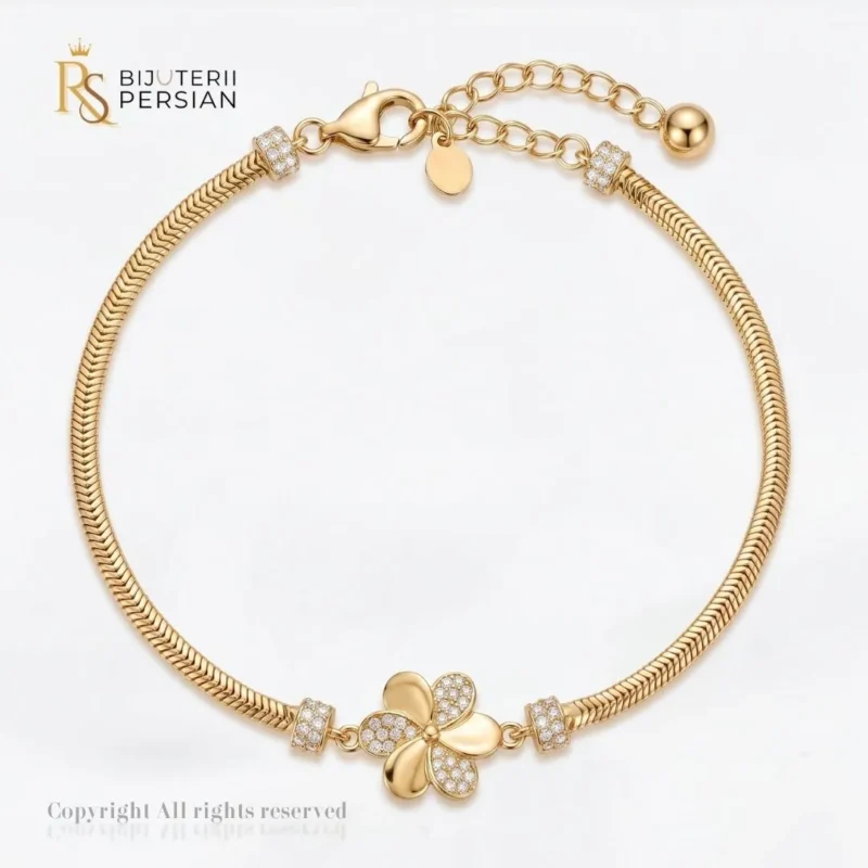 Bratara aur galben dama cu floare si zirconiu din aur 14K cu element floral central si lant herringbone impletit