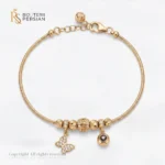 Bratara aur galben dama cu fluture si charme din aur 14K cu lant sarpe si elemente decorative cu zirconii