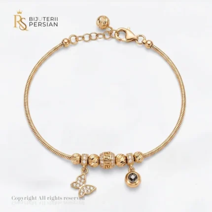 Bratara aur galben dama cu fluture si charme din aur 14K cu lant sarpe si elemente decorative cu zirconii