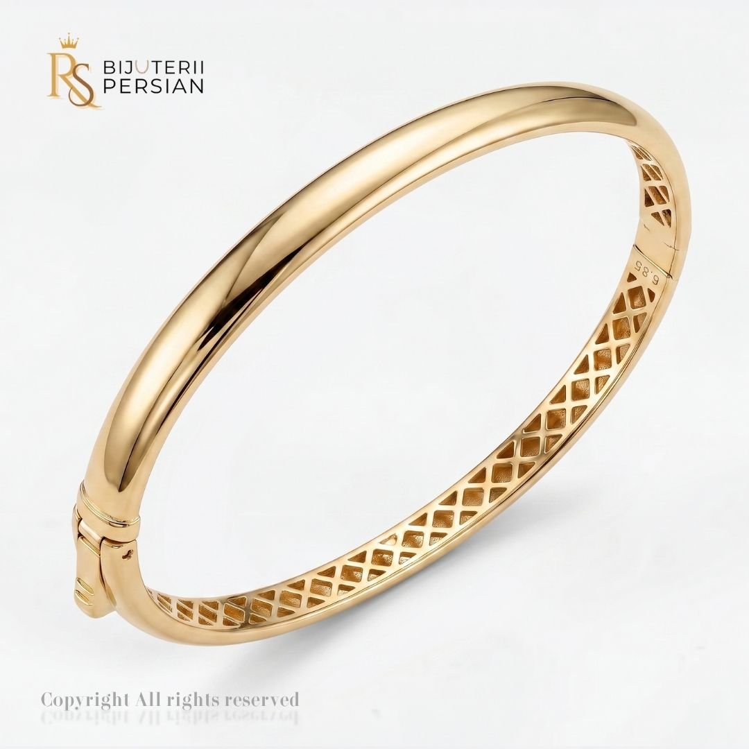 bratara-fixa-aur-galben-bombe-14k-fara-pietre-bijuterii-persian Bratara fixa aur galben bombe din aur 14K cu suprafata neteda si finisaj oglinda fara pietre cu interior ajurat