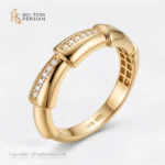 Inel aur galben stil bamboo cu zirconiu din aur 14K cu segmente curbate si pietre stralucitoare encastrate
