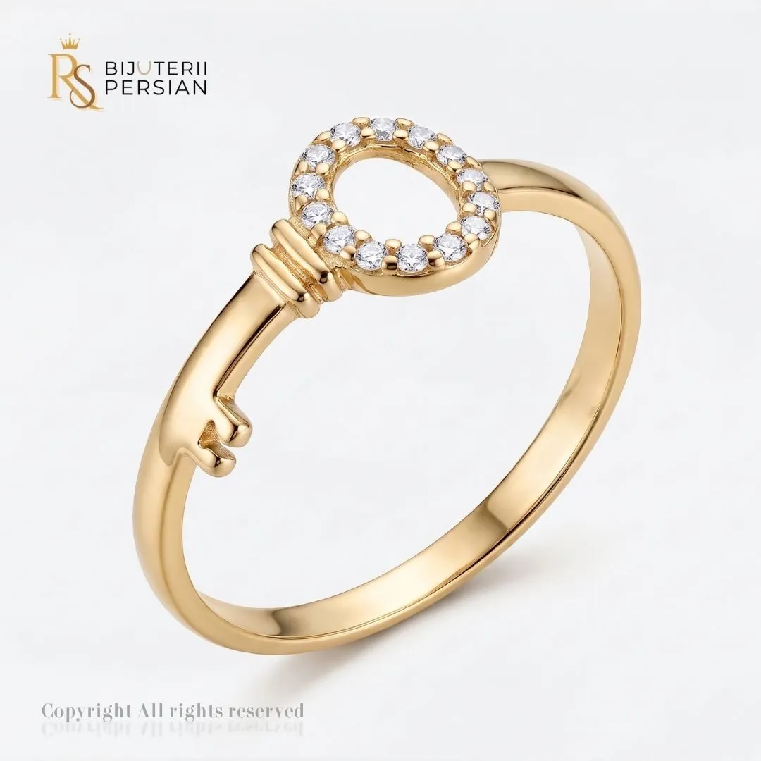 inel-aur-galben-tip-cheie-cu-zirconiu-14k-bijuterii-persian Inel aur galben tip cheie cu zirconiu din aur 14K cu contur oval encastrat cu pietre transparente
